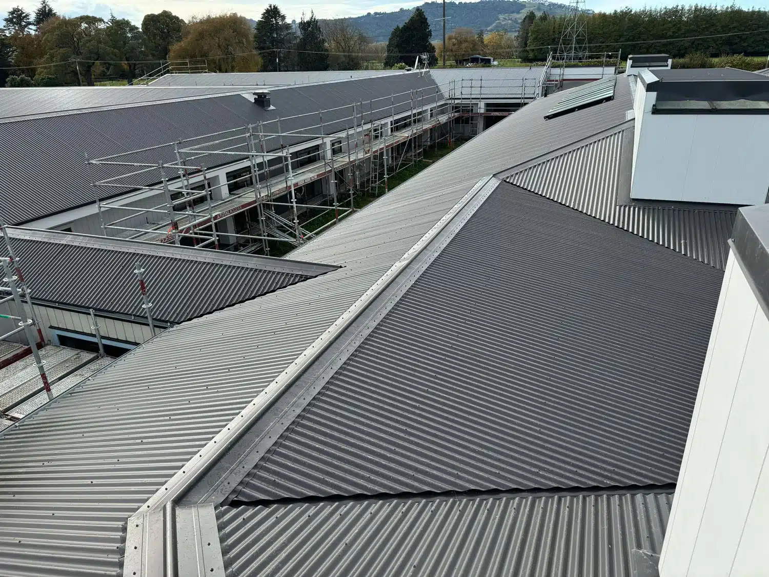 A Man Extend and Upgrades Roof 